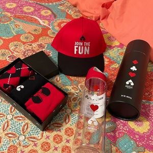 Carnival cruise line gift bundle, socks, cap, water bottle.